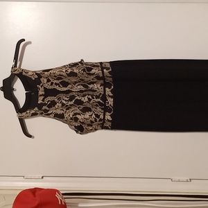 Black and gold evening gown with split in front